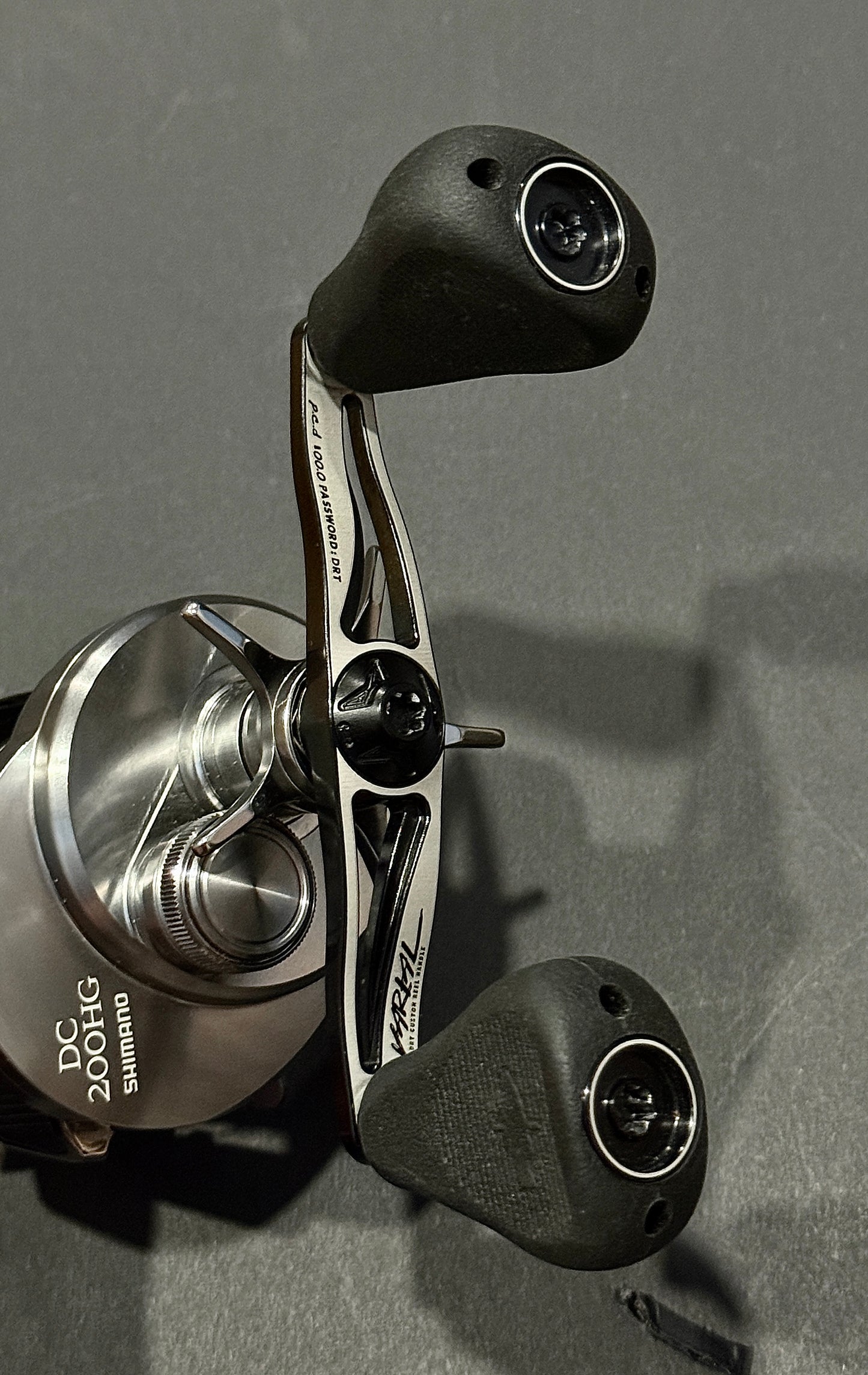 2020 Shimano Calcutta Conquest DC 200HG with 100mm White x Black Drt Varial Handle